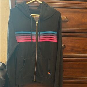 Black Zip-Up Hoodie with Vibrant Stripes